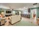 Open concept living room with view of the kitchen at 3404 Depew Ave, Port Charlotte, FL 33952