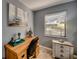 Home office or den with a desk, chair, and window providing natural light at 3404 Depew Ave, Port Charlotte, FL 33952