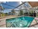Screened-in pool and patio area at 3404 Depew Ave, Port Charlotte, FL 33952