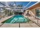 Screened pool area with ample space for relaxation and enjoyment at 3404 Depew Ave, Port Charlotte, FL 33952