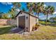 Shed with landscaping and a view of the water at 3404 Depew Ave, Port Charlotte, FL 33952
