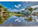 Picturesque waterfront property with lush greenery at 3404 Depew Ave, Port Charlotte, FL 33952