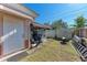 Large backyard with storage sheds and a small garden at 3530 25Th N Ave, St Petersburg, FL 33713