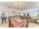 Bright dining room with wooden table, view into kitchen and living room at 3530 25Th N Ave, St Petersburg, FL 33713