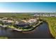 Aerial view of home on a canal with a private dock at 3700 Candia Dr, Punta Gorda, FL 33950