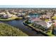 High angle shot of waterfront property with boat dock and canal access at 3700 Candia Dr, Punta Gorda, FL 33950