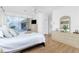 Main bedroom with sliding glass doors offering pool views and ensuite bathroom access at 3700 Candia Dr, Punta Gorda, FL 33950