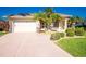 Front exterior view of home with paved driveway and double garage at 3700 Candia Dr, Punta Gorda, FL 33950
