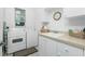 Laundry room with washer, dryer, and utility sink at 3700 Candia Dr, Punta Gorda, FL 33950