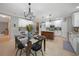 Kitchen with a dining table and chandelier at 3780 Cobblestone Ln, Punta Gorda, FL 33980