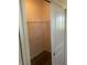 Walk-in closet with sliding doors and built-in shelving at 384 Prineville St, Port Charlotte, FL 33954