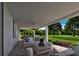 Covered patio with outdoor furniture, perfect for relaxing or entertaining at 384 Prineville St, Port Charlotte, FL 33954