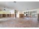 Spacious dining room with tile flooring and decorative wall features, currently under renovation at 48 Hibiscus Dr, Punta Gorda, FL 33950