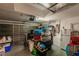 Garage with storage shelving and an assortment of items at 5325 Cillette Ave, North Port, FL 34288