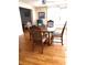 Lovely dining room with wood table and four chairs near a ceiling fan at 806 Hickory Ln, Bradenton, FL 34208