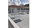 Relaxing pool area with lounge chairs and ample space, ideal for enjoying sunny days at 806 Hickory Ln, Bradenton, FL 34208