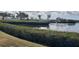 Scenic water view from the property, lined by lush green foliage at 806 Hickory Ln, Bradenton, FL 34208