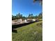A new home under construction with cinder block walls and surrounding trees and landscaping at 8161 Dressel St, Port Charlotte, FL 33981