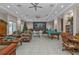Community room features a pool table, seating areas, and a wet bar at 10055 Links Ln # 306, Rotonda West, FL 33947