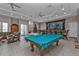 Community room with pool table and comfortable seating at 10055 Links Ln # 306, Rotonda West, FL 33947