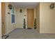 Private condo entrance with well-maintained landscaping at 10055 Links Ln # 306, Rotonda West, FL 33947