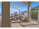 Outdoor grilling area with pergola and seating at 10055 Links Ln # 306, Rotonda West, FL 33947