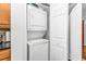 Convenient laundry closet with stacked washer and dryer at 10055 Links Ln # 306, Rotonda West, FL 33947