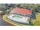 Resort-style pool with clubhouse featuring a covered patio area at 10055 Links Ln # 306, Rotonda West, FL 33947