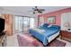 Spacious bedroom with king-size bed and patio access at 1219 Richter St, Port Charlotte, FL 33952