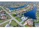Wide aerial showcasing neighborhood and canal at 1330 Appian Dr, Punta Gorda, FL 33950