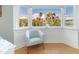 Bedroom sitting area with bay window and water views at 1330 Appian Dr, Punta Gorda, FL 33950