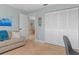 Guest bedroom with closet and view into dining area at 1330 Appian Dr, Punta Gorda, FL 33950