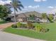 House exterior with landscaping and driveway at 1330 Appian Dr, Punta Gorda, FL 33950