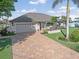 House exterior with landscaping and driveway at 1330 Appian Dr, Punta Gorda, FL 33950