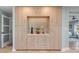 Modern kitchen boasts ample storage with light wood cabinets and a built-in buffet at 1330 Appian Dr, Punta Gorda, FL 33950