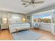 Main bedroom with king bed and bay window views at 1330 Appian Dr, Punta Gorda, FL 33950