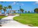 Park with a walking path, playground, and waterfront views at 1330 Appian Dr, Punta Gorda, FL 33950