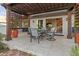 Covered patio with seating area and pergola at 1330 Appian Dr, Punta Gorda, FL 33950