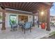 Covered patio with seating area and pergola at 1330 Appian Dr, Punta Gorda, FL 33950