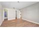 Spacious bedroom with laminate flooring and access to bathroom and closet at 13495 Martha Ave, Port Charlotte, FL 33981