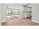 Dining area with sliding glass doors to a sunroom at 13495 Martha Ave, Port Charlotte, FL 33981