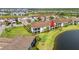 Elevated view of the home located next to a serene pond at 14016 Black Beauty Dr # 1711, Punta Gorda, FL 33955