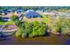 Aerial view showing home's backyard and canal access at 158 Eppinger Dr, Port Charlotte, FL 33953