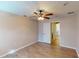Bright bedroom with ceiling fan and wood-look flooring at 158 Eppinger Dr, Port Charlotte, FL 33953
