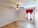 Bedroom featuring wood-look flooring and a ceiling fan at 158 Eppinger Dr, Port Charlotte, FL 33953
