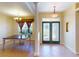 Dining room features a table and chairs near the entryway at 158 Eppinger Dr, Port Charlotte, FL 33953