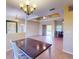 View of the dining room from the living area at 158 Eppinger Dr, Port Charlotte, FL 33953