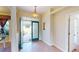 Bright entryway with tile flooring and double doors at 158 Eppinger Dr, Port Charlotte, FL 33953