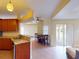 Open kitchen with granite countertops and breakfast nook at 158 Eppinger Dr, Port Charlotte, FL 33953