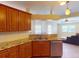 Kitchen with granite countertops and wood cabinets at 158 Eppinger Dr, Port Charlotte, FL 33953